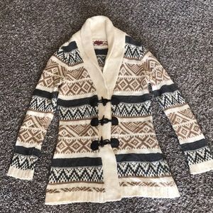 Long toggle button sweater